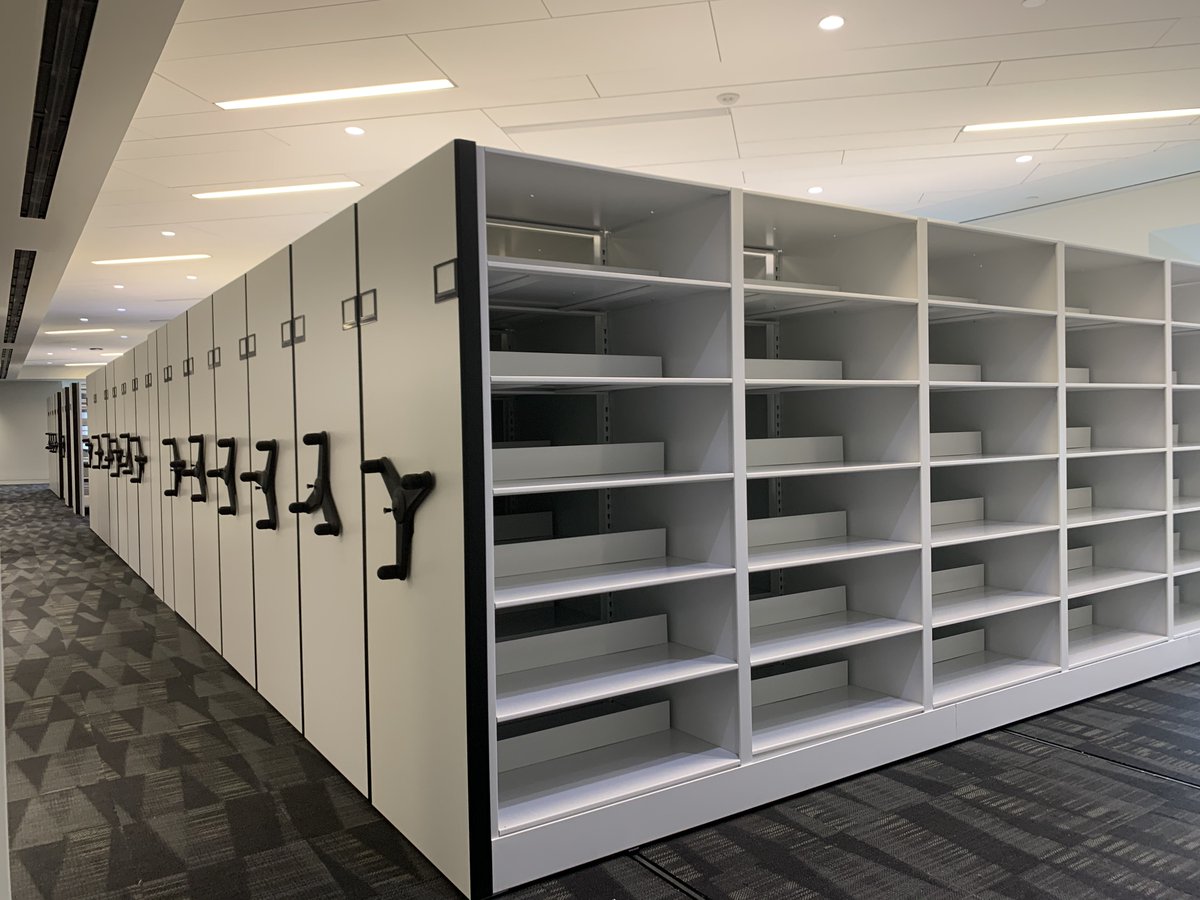 ModernOfficeSys's tweet photo. Modern just completed this mechanical high density system for a top publishing firm. This install allows our client to store onsite archival materials &amp; new media. Remember, HD storage is not just about boxes! Let us know what your needs are; we have your solution! #highdensity https://t.co/DHv8mcDK6K