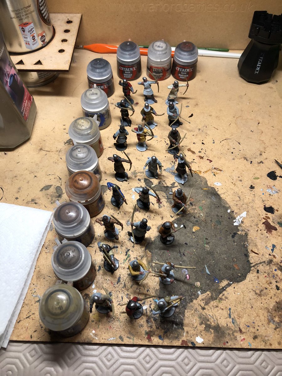 Too many shades of brown? I’ve devised a grid system where each model gets lined up with two shades at random, which are then used for odd details like belts, gloves, daggers, pouches, shoes, etc. Means no two are exactly alike!