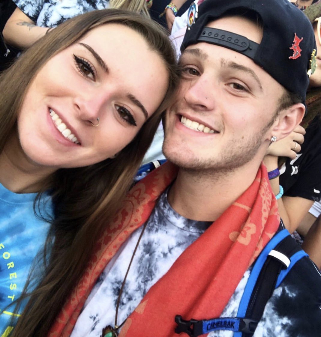 jashley1211's tweet photo. in memory of dead rocks here’s a cutie patiotie picture of me and the love of my life enjoying the boys last year https://t.co/W4P08rKN02