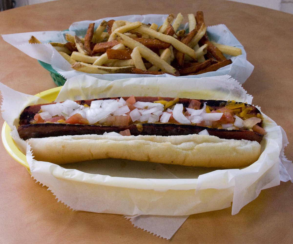 Featured this month- The Phil's Footlong Dog- topped with onions, tomatoes, shredded cheese and for a little extra our house made chili