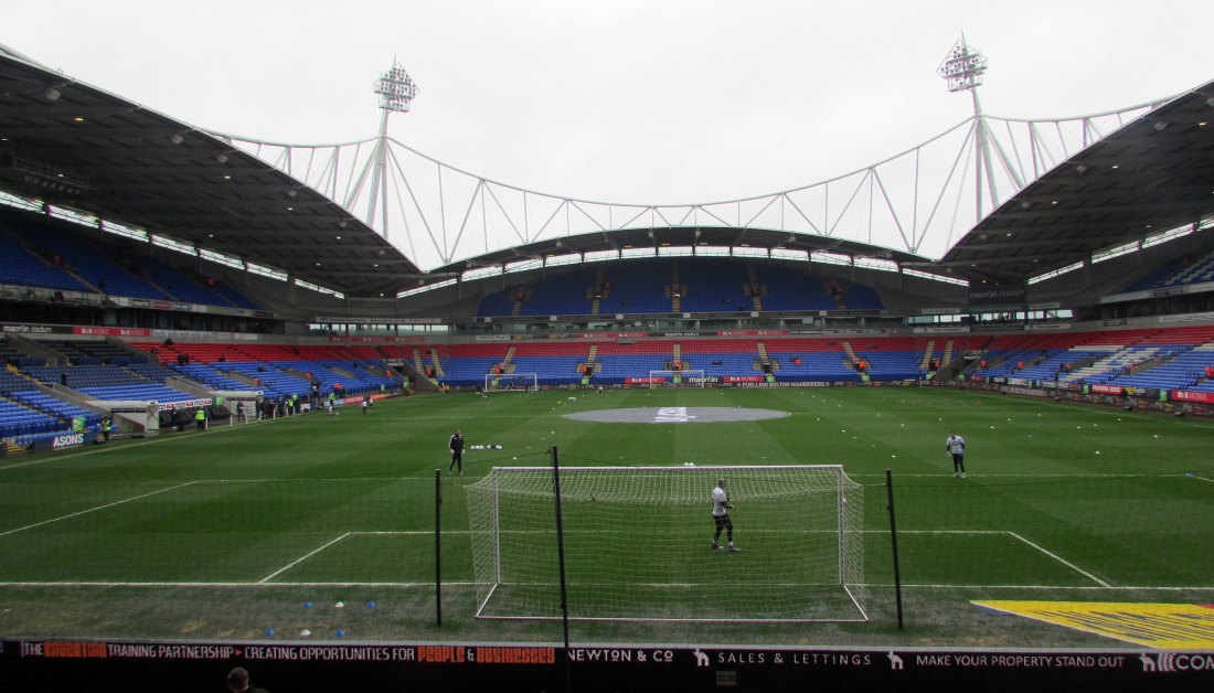 Bolton- Ibiza. Class stadium it must be said, many have been over the years. Don't pack sun cream though, Bolton's colder then Jose Mourinho after a home loss.