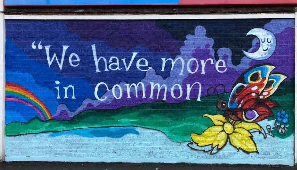 evefrancisholt's tweet photo. Hurray, mural is done &amp; looking great. A great excuse for a walk around #Chorlton. It was painted as part of the @chorltonhigh #Beelong festival &amp; in lieu of our #GreatGetTogether(Apart) in June.  Thank you to @lemnsissay &amp; to all who helped make it happen. #MoreInCommon  ❤️❤️ https://t.co/tvf7aOmEDX