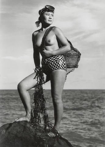 This is the work of Japanese photographer Yoshiyuki Iwase (1904-2001). Yoshiyuki was born in in Onjuku, a fishing village on the pacific side of the Chiba peninsula, near Tokyo Bay. He spent his career photographing the ama free divers, women who fished along the coast. Thread