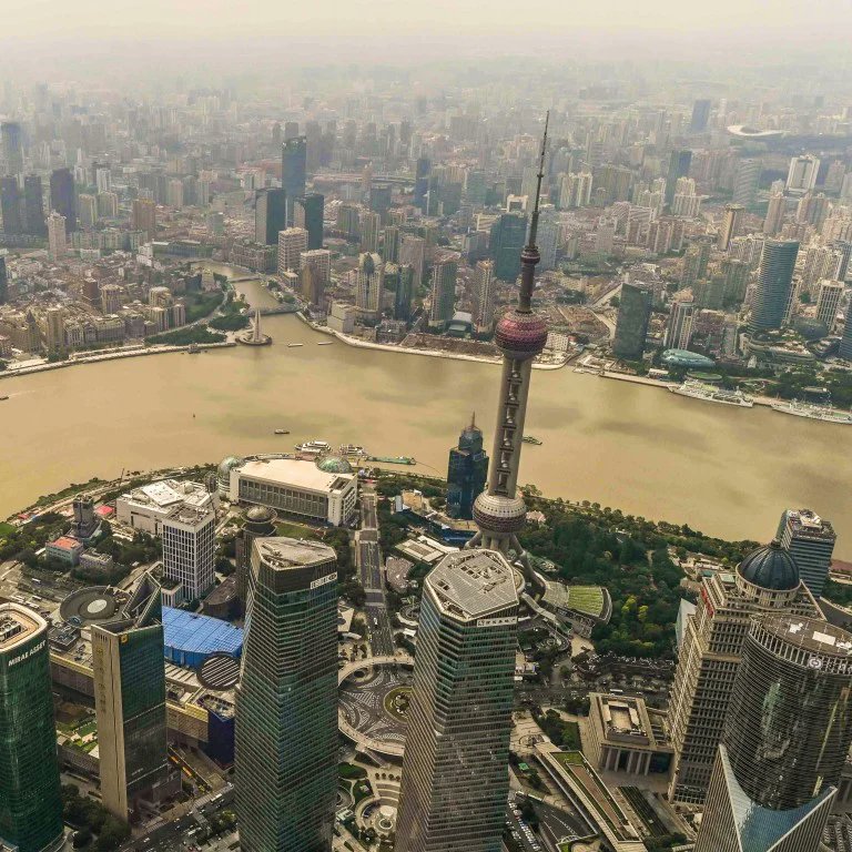 Salford-China. Filthy rich, would find more culture wondering around Reading at night. Both look like they were built last week too.