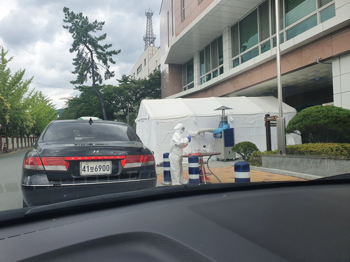I scheduled a drive-thru test for 3pm, about 10 hours after I arrived at the airport. The testing center looked like this. They performed both an up-the-nose test and a back-of-the-throat test. Uncomfortable, but fast and painless.