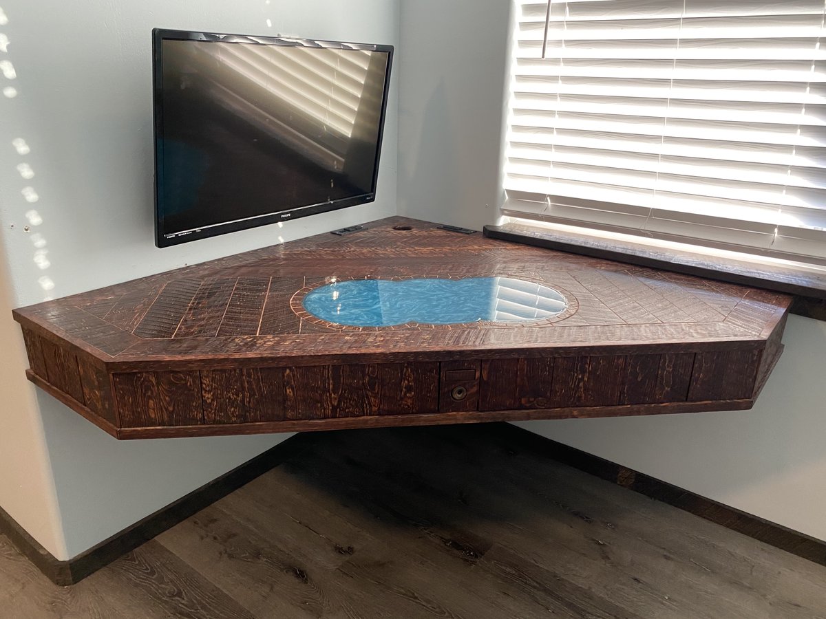 Handmade, floating corner, wall mount, desk.
Has flat, resin, writing surface, hidden storage, special feature wand, and power/USB combo outlets.
Link to product video tour: youtu.be/Wjqa4a1x-KY
#homeoffice #handmade #wizarddesk