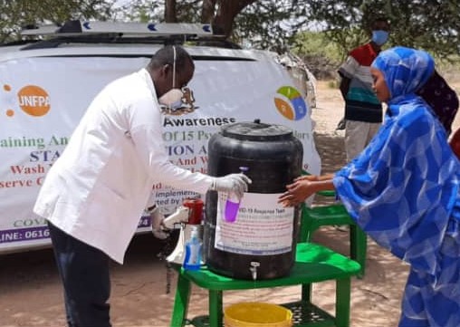 Ard_somalia's tweet photo. Promotion campaign to combat @SomaliaCovid19 in #Elwak district of #Gedo region somalia, @Ard_somalia carried out awareness campaign to sensitize residents of   remote villages in Elwak.

@UNFPA_SOMALIA https://t.co/K4xu5xXDEC