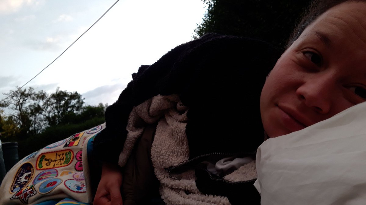 HollyReding's tweet photo. This was me shortly after sunrise this morning, part of the @gguidinganglia #MidsummerChallange It's fair to say I've never made a bivvy in my garden before! #NorwichGuides https://t.co/Q2ViZTrrWr