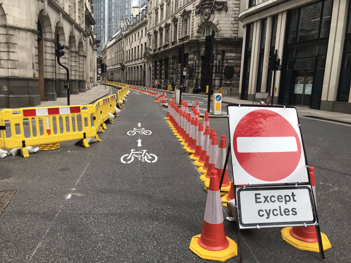 In the surrounding area, quite a few streets have been converted to one-way for general traffic, with widened footways and contraflow cycling with cone protection. No protection at junctions