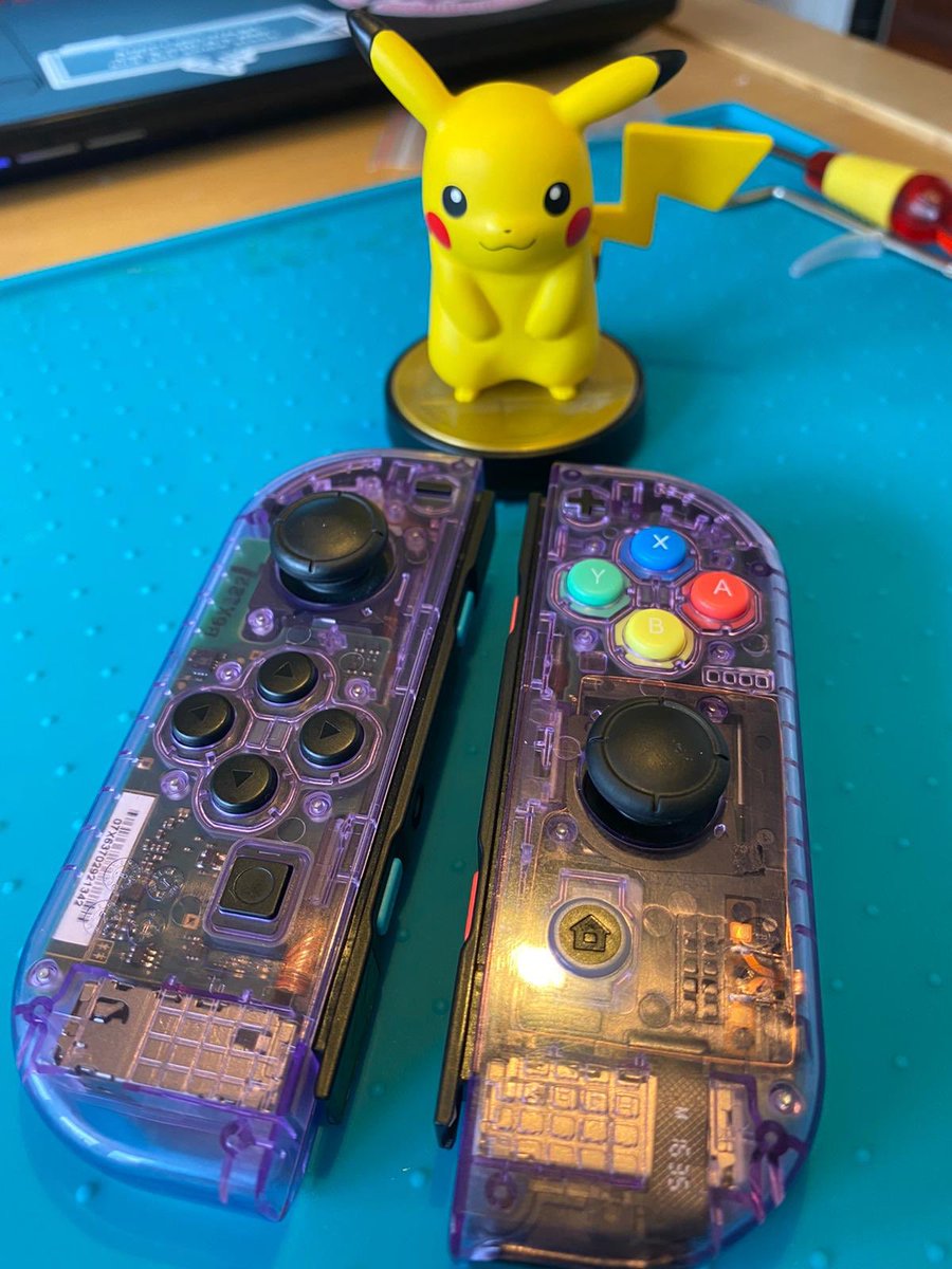 So, not tabletop gaming but gaming and geek adjacent! I spent yesterday customising my switch controllers! I think they look great! (They started out as the original neon and red ones).  #gaming #NintendoSwitch #nintendo #pokemon #ttrpg #dungeonsanddragons