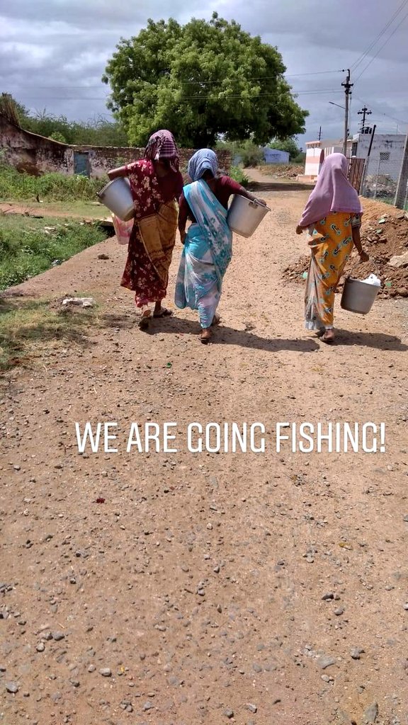 On the way to the pond... LM is in jamun colored saree. I am grinning because this way the first time, I was allowed to step out in my tee without getting nagged to change into something 'decent'Towels on head as my village is really hot even in winter.