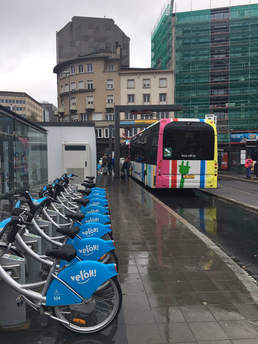 1st view  A lovely stained-glass window in the station, the info board-cum-totem board, bike hire,  buses & an election poster in Luxembourgish if you want to see what this weird language looks like. Basically dodgy Germany with a French twang  #Luxembourg  #Luxembourgish