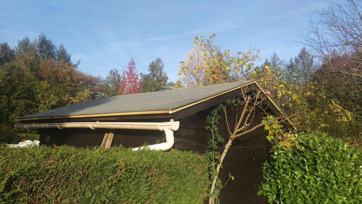 Stripped of the old felt roof and battens on this garden summerhouse in the Charente, then renewed all.