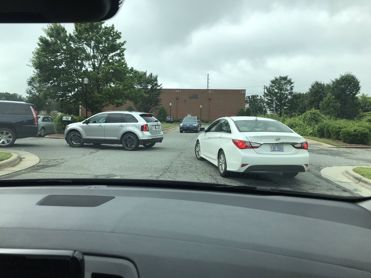 MattHunnes's tweet photo. @HuntersvilleGOV Can we send a crew out to repaint the faded lines on Compass St. behind Dunkin Donuts? Drivers apparently don’t know there’s a turn lane there and so the drive through line backs up the street in both directions. https://t.co/aqk1eQMALf