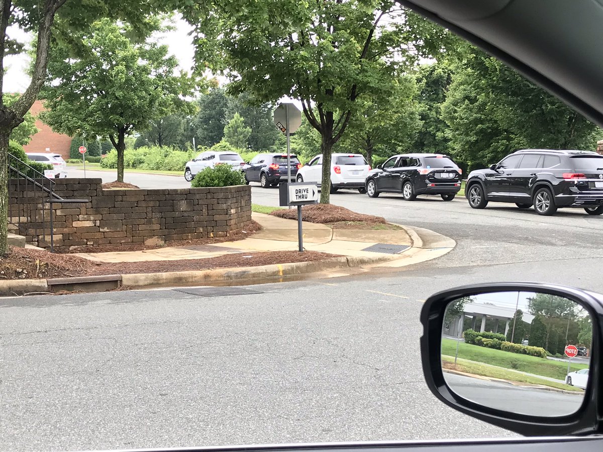 MattHunnes's tweet photo. @HuntersvilleGOV Can we send a crew out to repaint the faded lines on Compass St. behind Dunkin Donuts? Drivers apparently don’t know there’s a turn lane there and so the drive through line backs up the street in both directions. https://t.co/aqk1eQMALf