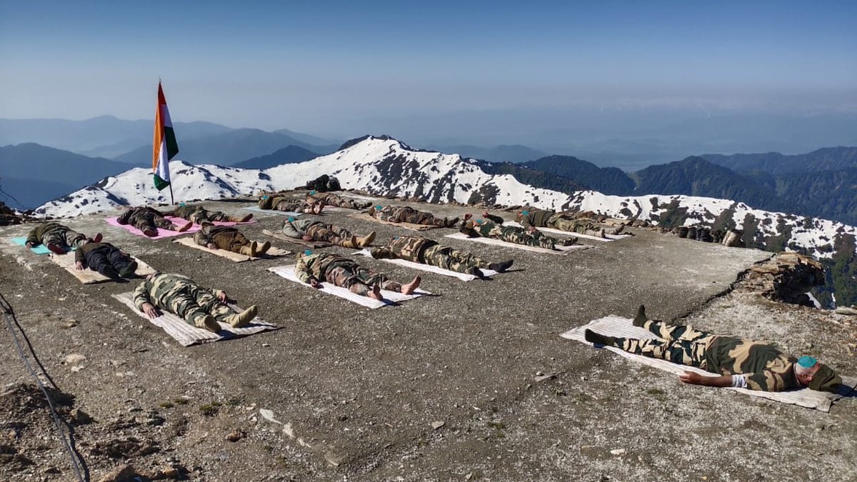 BSF_India's tweet photo. Atop icy peaks along the Line of Control, sentinels of our frontiers keep themselves in their peak fitness with yoga. The border is our Home. #IdoYogaatHome #Internationalyogaday2020
#YogaDay @moayush #JaiHind @BSF_Kashmir https://t.co/HbWWk5JAW8