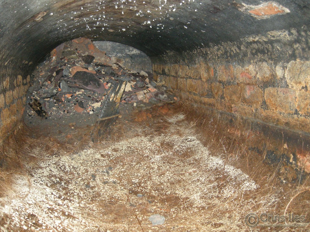 5 – ...Another Tunnel discovered on Mason Street quite by accident.A small dip in the ground was found to lead into a previously unknown Tunnel. These photographs were taken by lowering a small camera down this hole into the previously unknown Tunnel