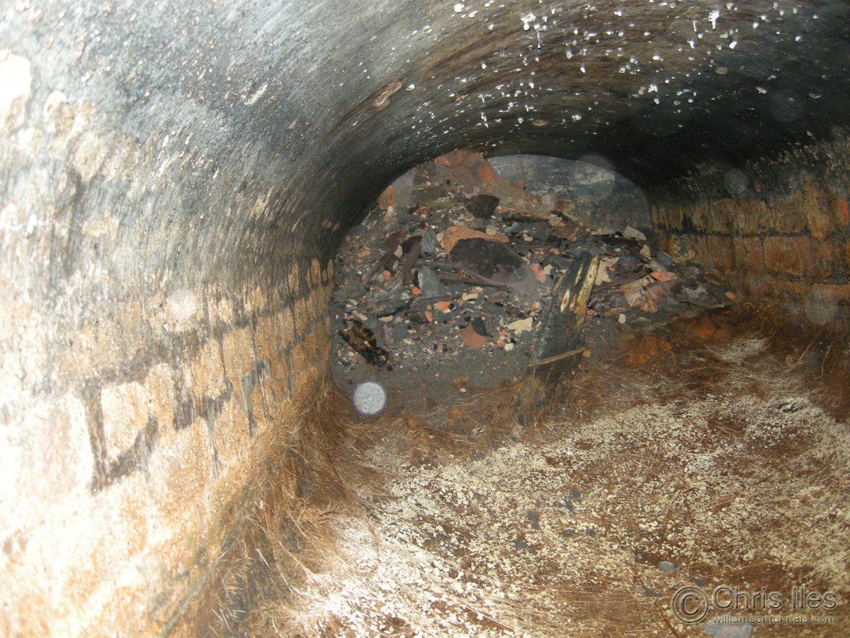5 – ...Another Tunnel discovered on Mason Street quite by accident.A small dip in the ground was found to lead into a previously unknown Tunnel. These photographs were taken by lowering a small camera down this hole into the previously unknown Tunnel