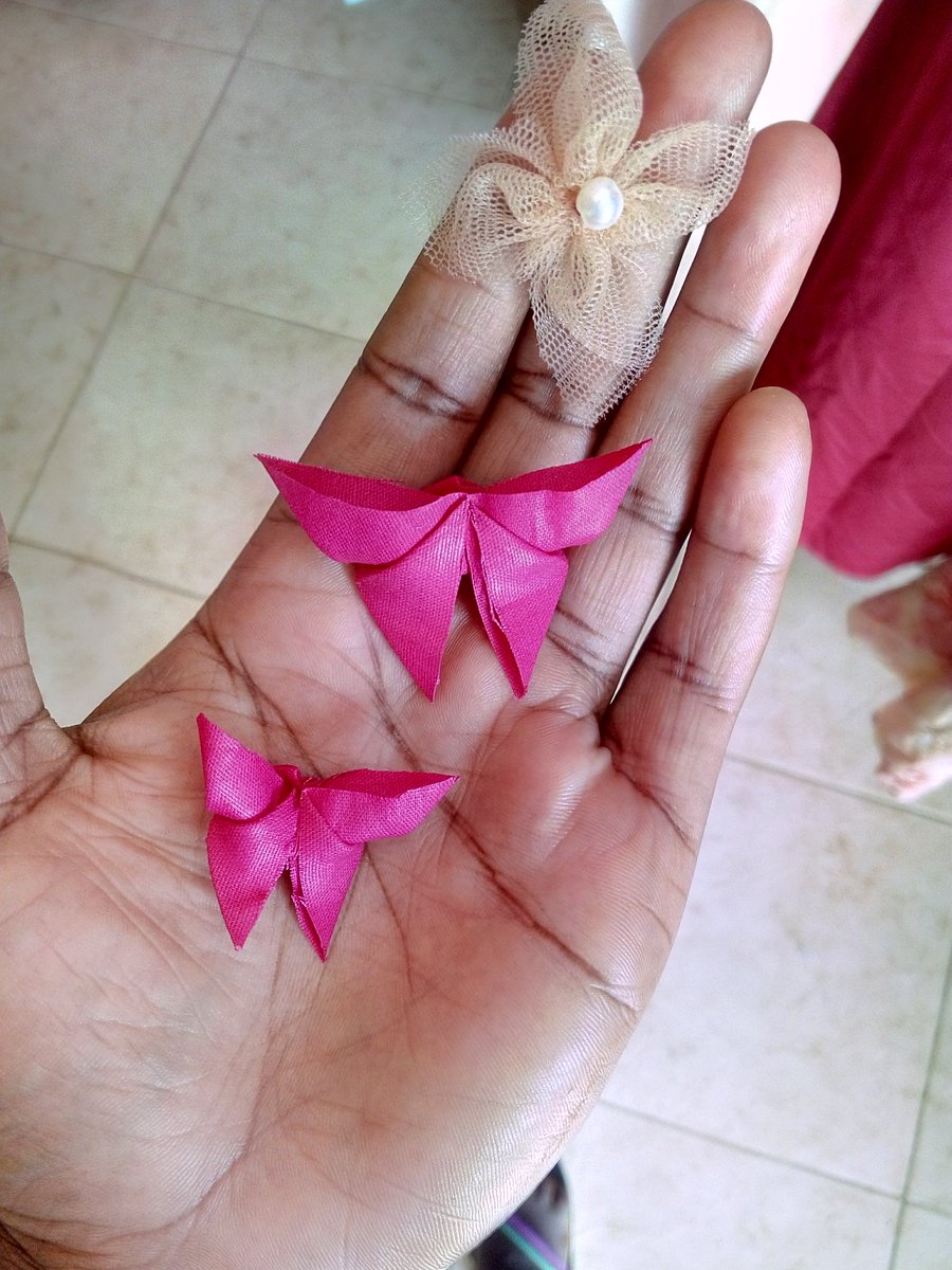 ...making a bridesmaid dress, butterflies with flowers #Uganda #VogueChallenge #tailors