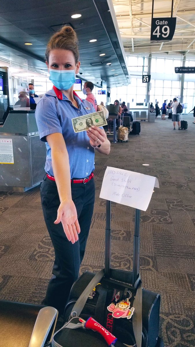 tailsfrm33000ft's tweet photo. My crew had a little fun &amp; put my bags for sale while I was in the restroom. The sign reads: “Yard Sale! Good stuff! (Dirty clothes free), Make offer.” I got a whole dollar! #crewlife #crewfun @SouthwestAir https://t.co/hiYbMQaMoI