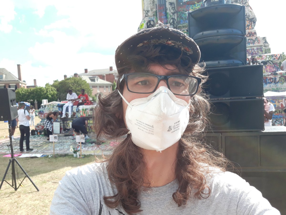 I am at the graffiti covered Lee statue in Marcus-David Peter Circle in Richmond, Virginia. I got my mask on and I am experiencing the activities here on this Juneteenth weekend. It's been 24 straight days of political action in town.