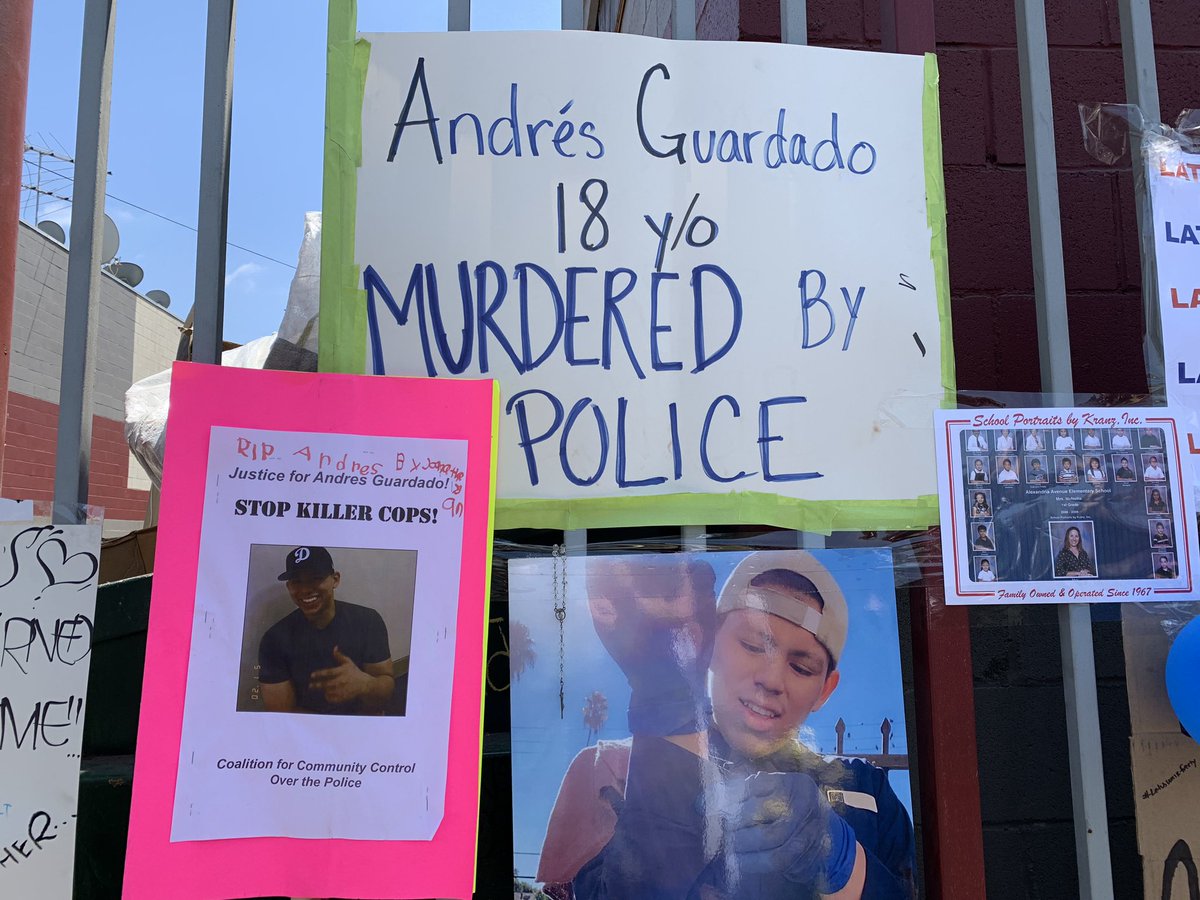 A memorial to  #AndresGuardado outside auto body shop by where he was fatally shot by a sheriff’s deputy last week.  @LASDHQ says Guardado fled patrol officers on foot when they approached. His family says he was doing his job as a security guard, and disputes  @LASDHQ account.