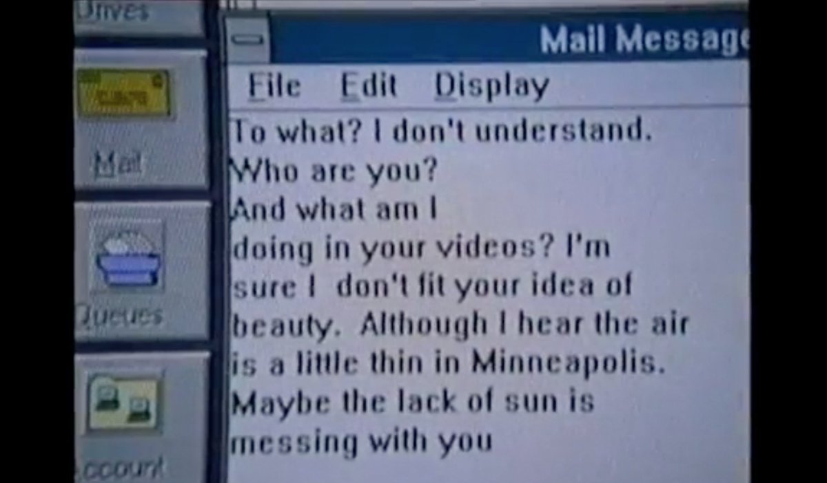 Early in the video, Pam writes to the interactive service/software that “I’m sure I don’t fit your idea of beauty,” and demands that it responds to her reply. And after sending her email, a performance of “Race” begins to play on her computer