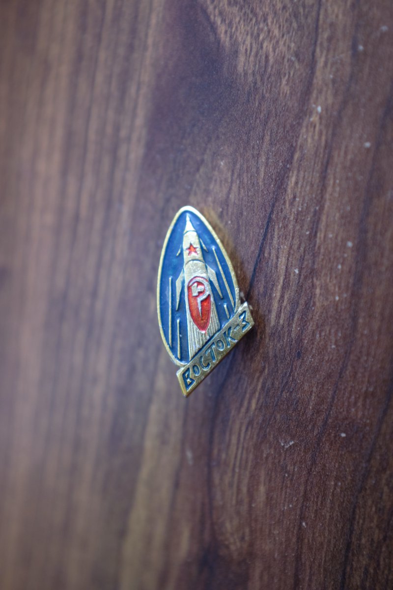 This pin commemorating solely Vostok 3 (poor Nikolayev ) is one of my favorites in my collection. I just think the design and forced prospective is really striking.And it's still in remarkably good shape!The bottom is labeled, of course, "Vostok 3."5/