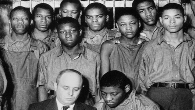 #79: Scottsboro Boys (Part 1)Early in the depression, 9 black boys were catching a freight train to Memphis in search for work. In Scottsboro they were hauled off after a fight between the boys & a WM broke out. They were later accused of raping 2 white women on the train