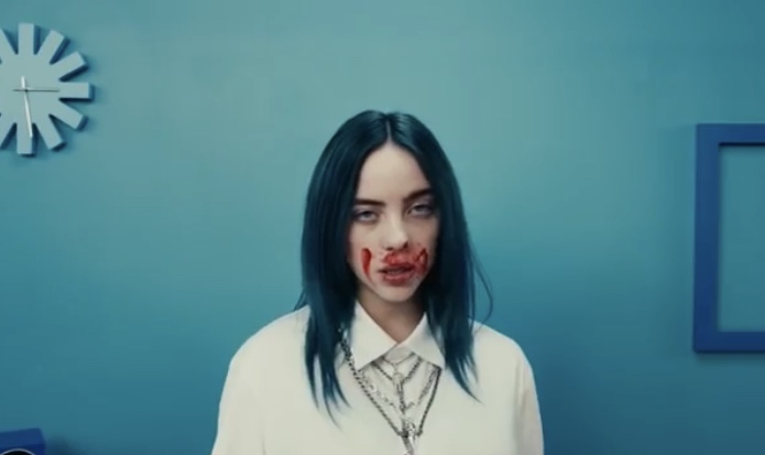 21c) next scene: blue room, white clothes, & she’s wiping blood from her nose all over her face. “Blue Room” is slang for a morgue & they cover dead bodies in white sheets. Blood can signify death, life, pain, ritual...or too much coke. I think her handlers think they’re funny.