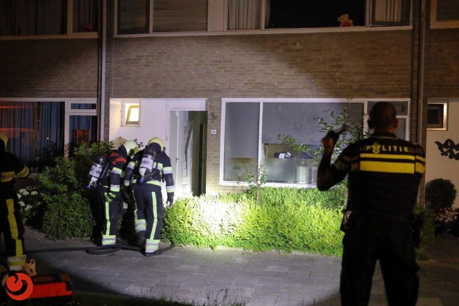 Slapende bewoner gered bij brand in woning