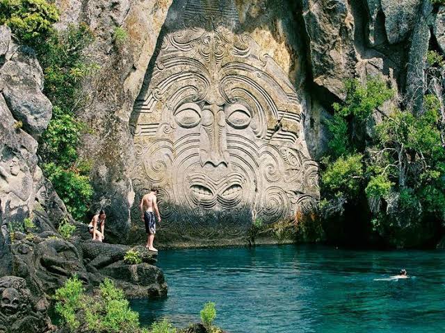 a carved wall. i bet this took daysss . oh and a cute kiwi at the end