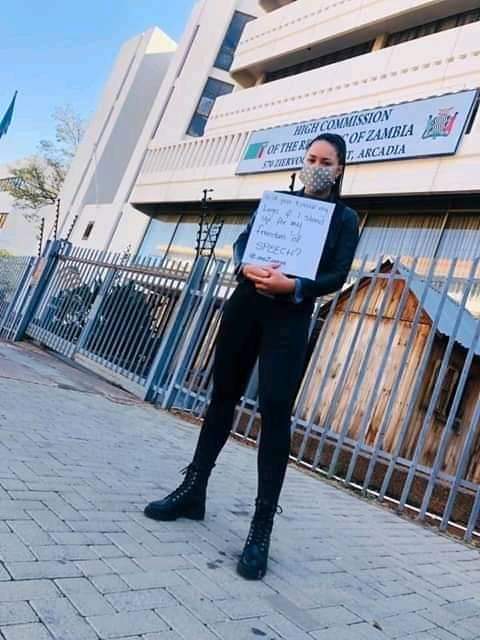 Mwebantu's tweet photo. #TRENDING 

 A lone youth protests for Freedom of Expression at the #Zambian High Commission in #Pretoria , South Africa. https://t.co/iZBZYpJtPV