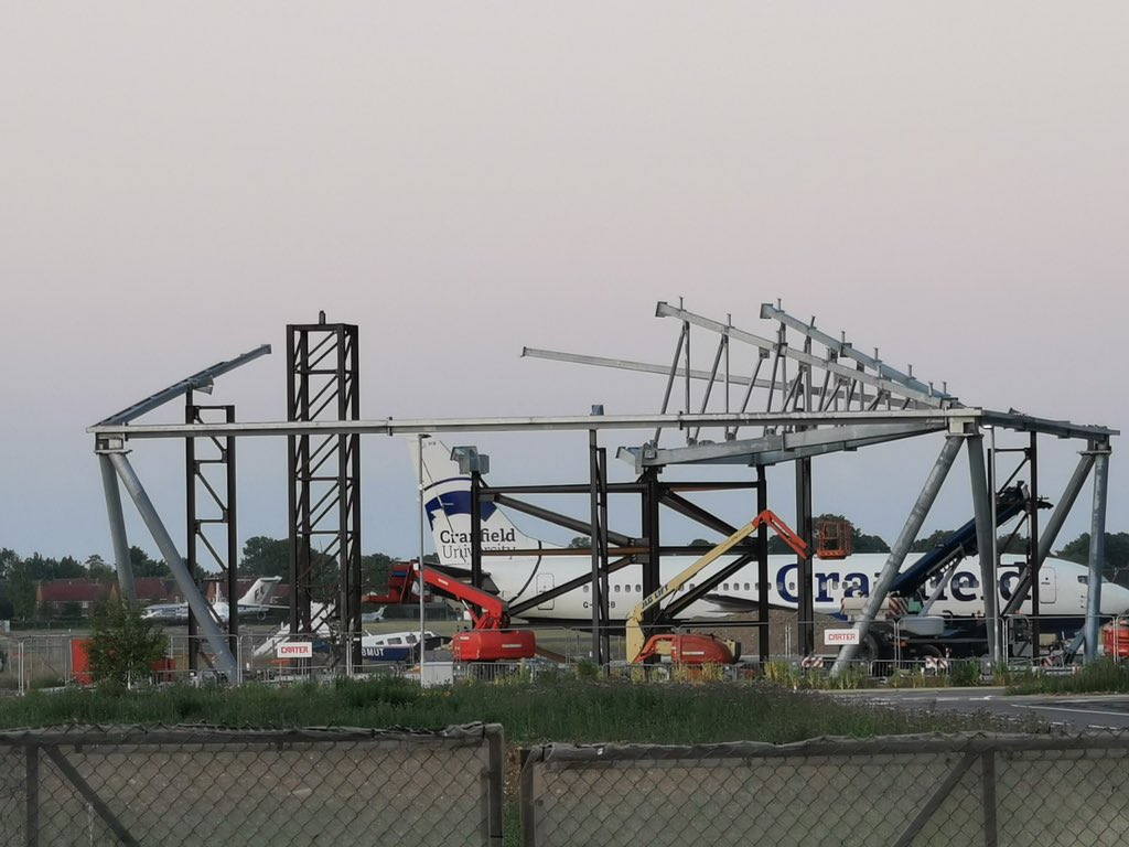 cranfielddartec's tweet photo. Another great photo from Dr Ip-Shing Fan of the DARTeC hangar lab structure which will provide cover for @CranfieldUni’s Boeing 737 and allow us to do work on Future Maintenance, Repair and Overhaul #MRO with partners like @BoeingUK @ResEngland #RPIF https://t.co/h9YAVkLabp