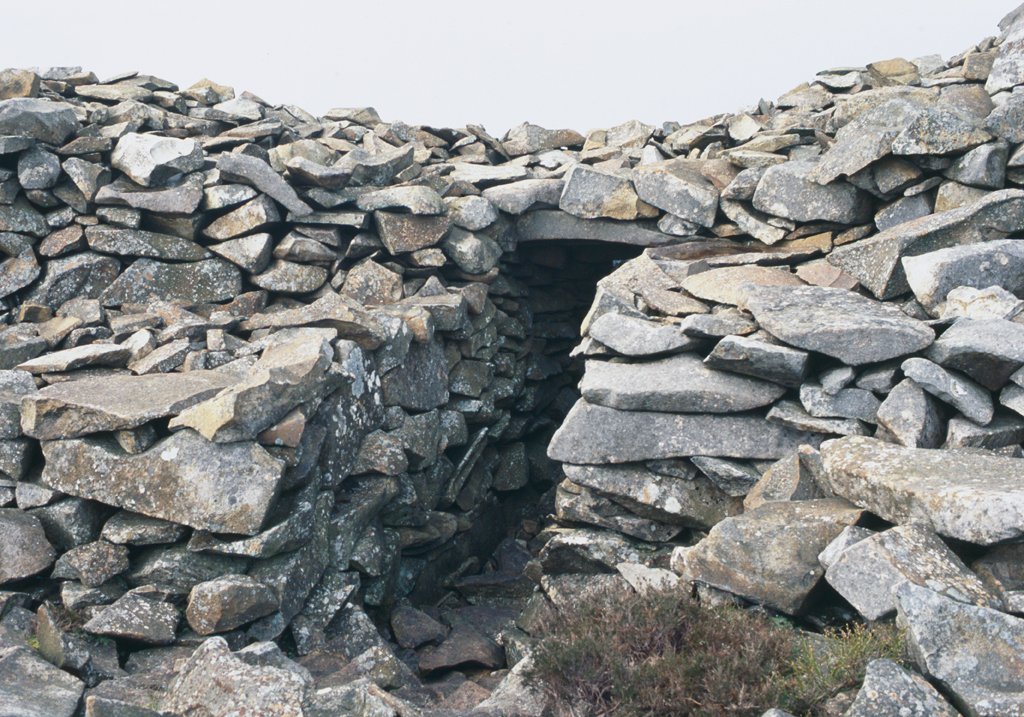 Surrounded by a massive 3.5m (11ft) tall stone wall, Tre'r Ceiri's round houses, gateways and ramparts are in remarkable condition. The mountain was a highly strategic vantage point for a succession of peoples, from the Bronze Age through to Roman occupation.
