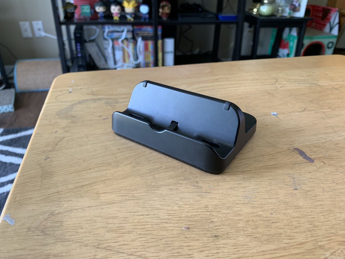 maddieofbeebalm's tweet image. So I know the switch’s kickstand sucks and I wanted to share my solution! I got a old Wii U gamepad charging dock and I took the roller wheels out and it made it into a little stand that actually works really well! And if you have one lying around it’s free! #switchhacks 👌🏻👌🏻