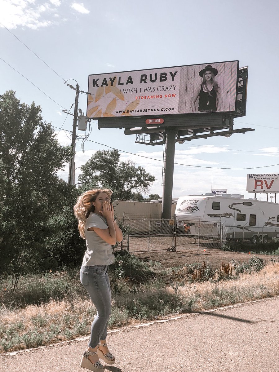 kaylarubymusic's tweet photo. my face is ON A BILLBOARD!! 🤯🤩 thank you all for making my dreams a reality! I love you all so so much! go stream I Wish I Was Crazy 🌻🎶 https://t.co/9Kxq2dYipy