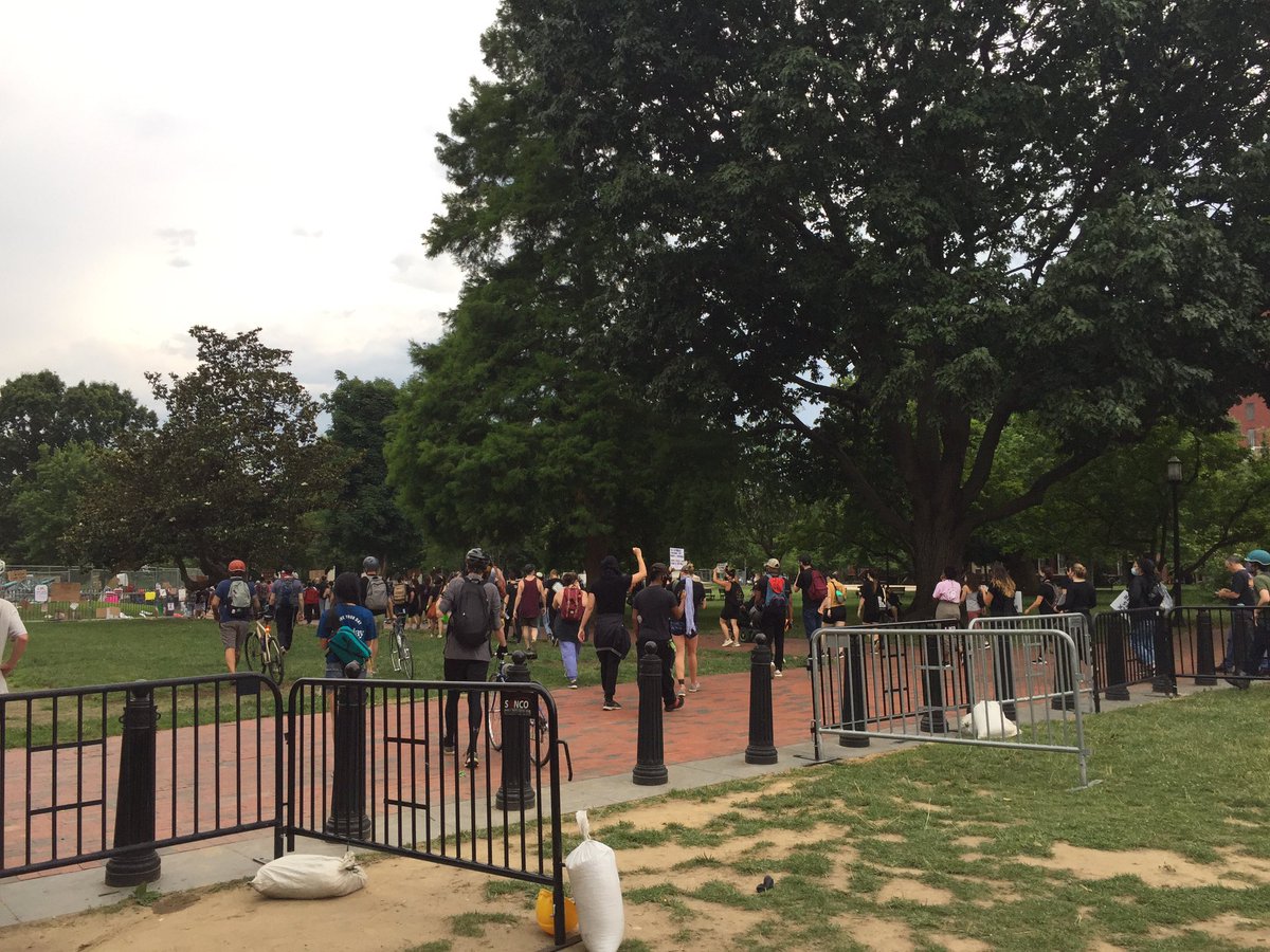 Probably about 200 people here, after a call went out to defend the street in the event police come back to remove the barriers. Now a group matching through Lafayette Square to congregate outside the White House. About 8 officers looking on, appear to be Park Police.