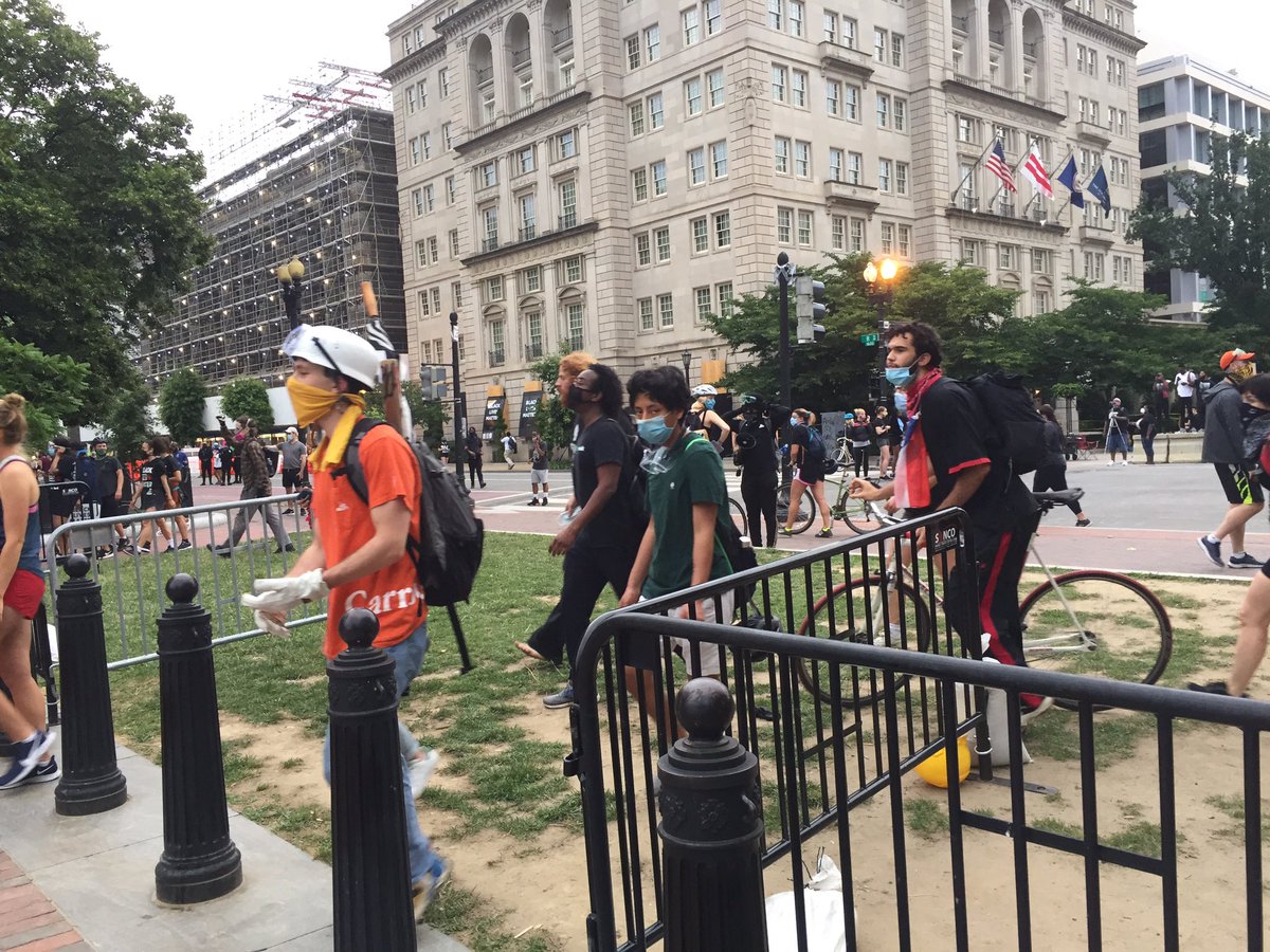 Probably about 200 people here, after a call went out to defend the street in the event police come back to remove the barriers. Now a group matching through Lafayette Square to congregate outside the White House. About 8 officers looking on, appear to be Park Police.