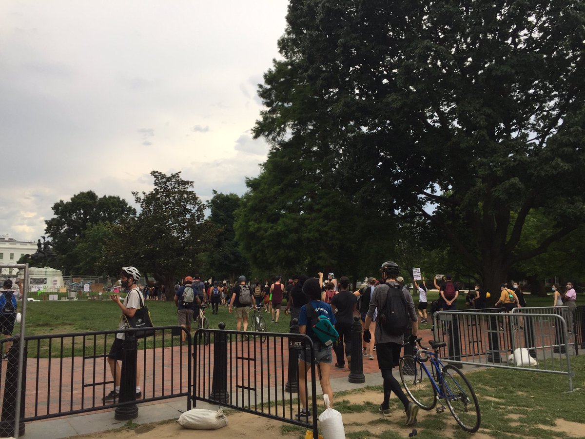 Probably about 200 people here, after a call went out to defend the street in the event police come back to remove the barriers. Now a group matching through Lafayette Square to congregate outside the White House. About 8 officers looking on, appear to be Park Police.