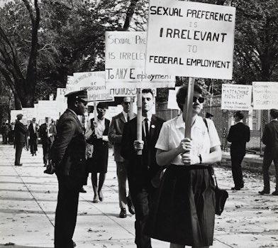 In recognition of  #Pride   month, I want to share & celebrate the story of the trailblazing Black woman in these photos: Ernestine Eckstein.These photos of her picketing w/a sign reading "Denial of Equality of Opportunity is Immoral" were taken in Oct of 1965 in front of the WH.