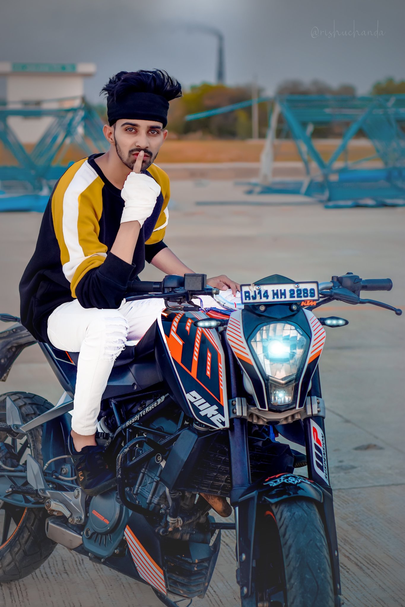 Boy posing on Royal Enfield bike - PixaHive