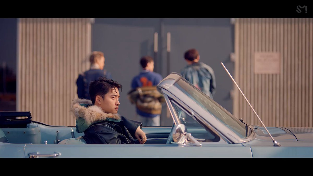 X-SKY were seen with D.O. in this particular scene, D.O. drove them to that bank. And of course for the rest of the MV, those 3 stuck together, doing everything together.  #EXO  @weareoneEXO