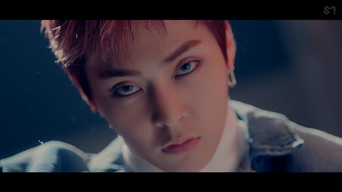 Now then, who might be 'switched' in LOVE SHOT MV?I'm guessing it's Xiumin and D.O. - because Xiumin was seen wearing a mask and D.O. spilling the cube. I remember I said Xiumin might be a spy from EXO to the Red Force sent by Suho. But we don't know that for sure.  @weareoneEXO