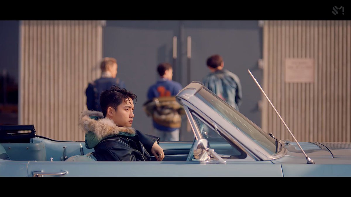 Now then, who might be 'switched' in LOVE SHOT MV?I'm guessing it's Xiumin and D.O. - because Xiumin was seen wearing a mask and D.O. spilling the cube. I remember I said Xiumin might be a spy from EXO to the Red Force sent by Suho. But we don't know that for sure.  @weareoneEXO