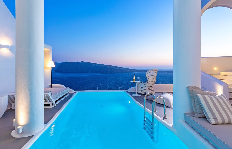 ARCHLABEL's tweet photo. Cliff edge pools in Santorini, Greece. https://t.co/Y9wQIxHyUl