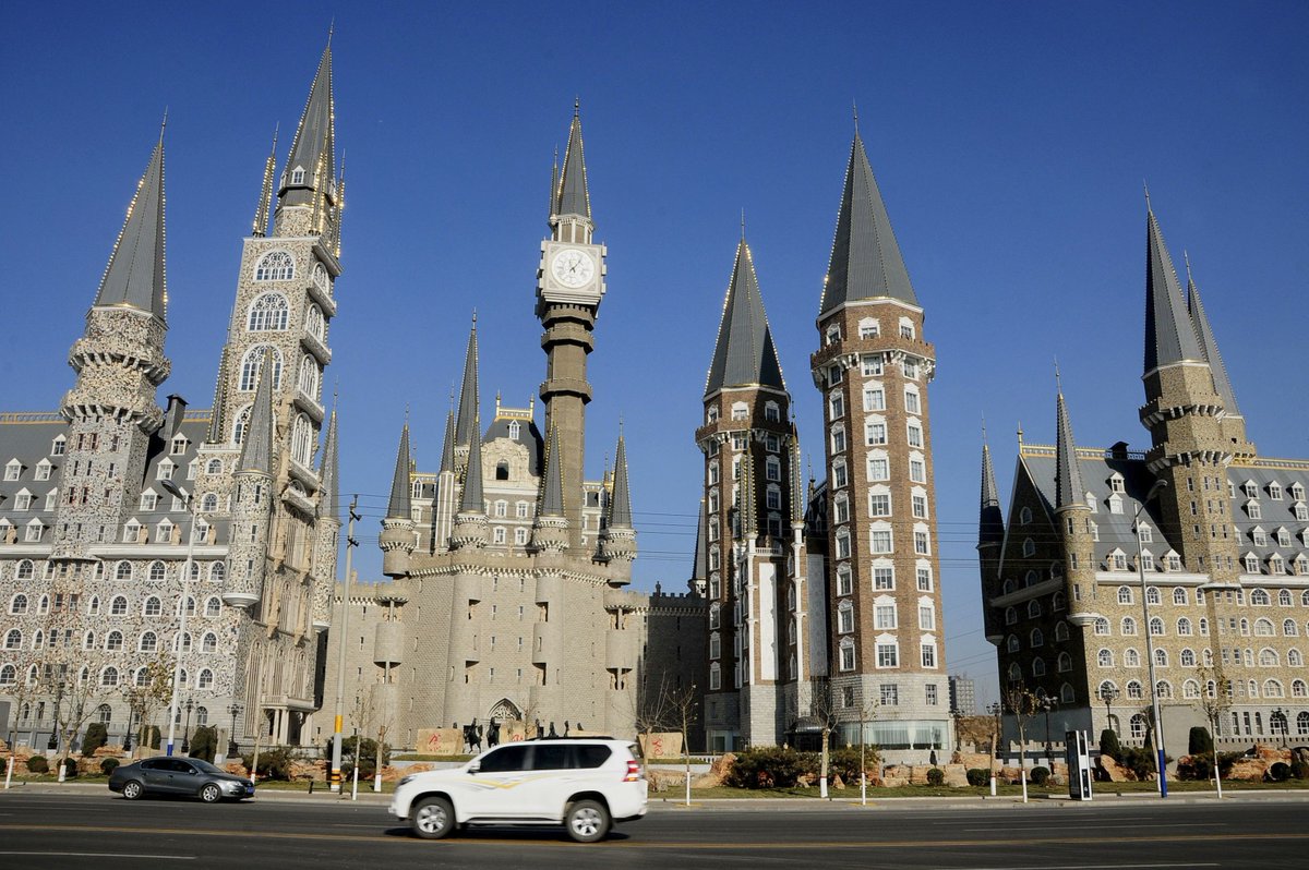 Like in America 100+ years ago, colleges are some of the leaders on this architectural style. The "Chinese Hogwarts" is the Hebei Academy of Fine Arts, while the giant brick campus is the Sichuan College of Civil Aviation.