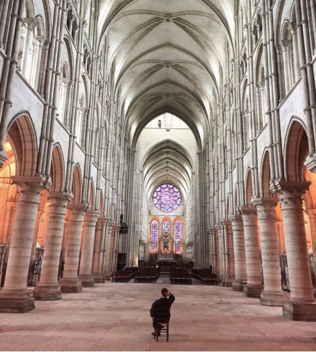 Nominated by  @gilliandarley for 10 buildings I love. 1. Laon Cathedral - here I am sitting in empty nave. Laon wears the then-new Gothic style with such graceful & intellectual ease I wondered if all later Gothic a debasement. I'm not normally into perfection - but here it is.