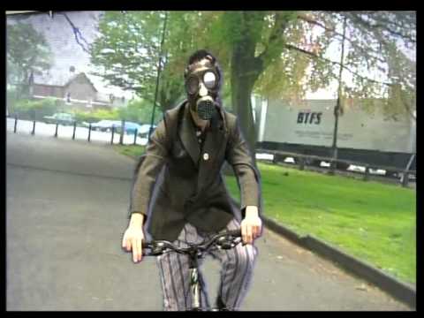 Alan wore a gas mask while riding his bike to combat his allergies.