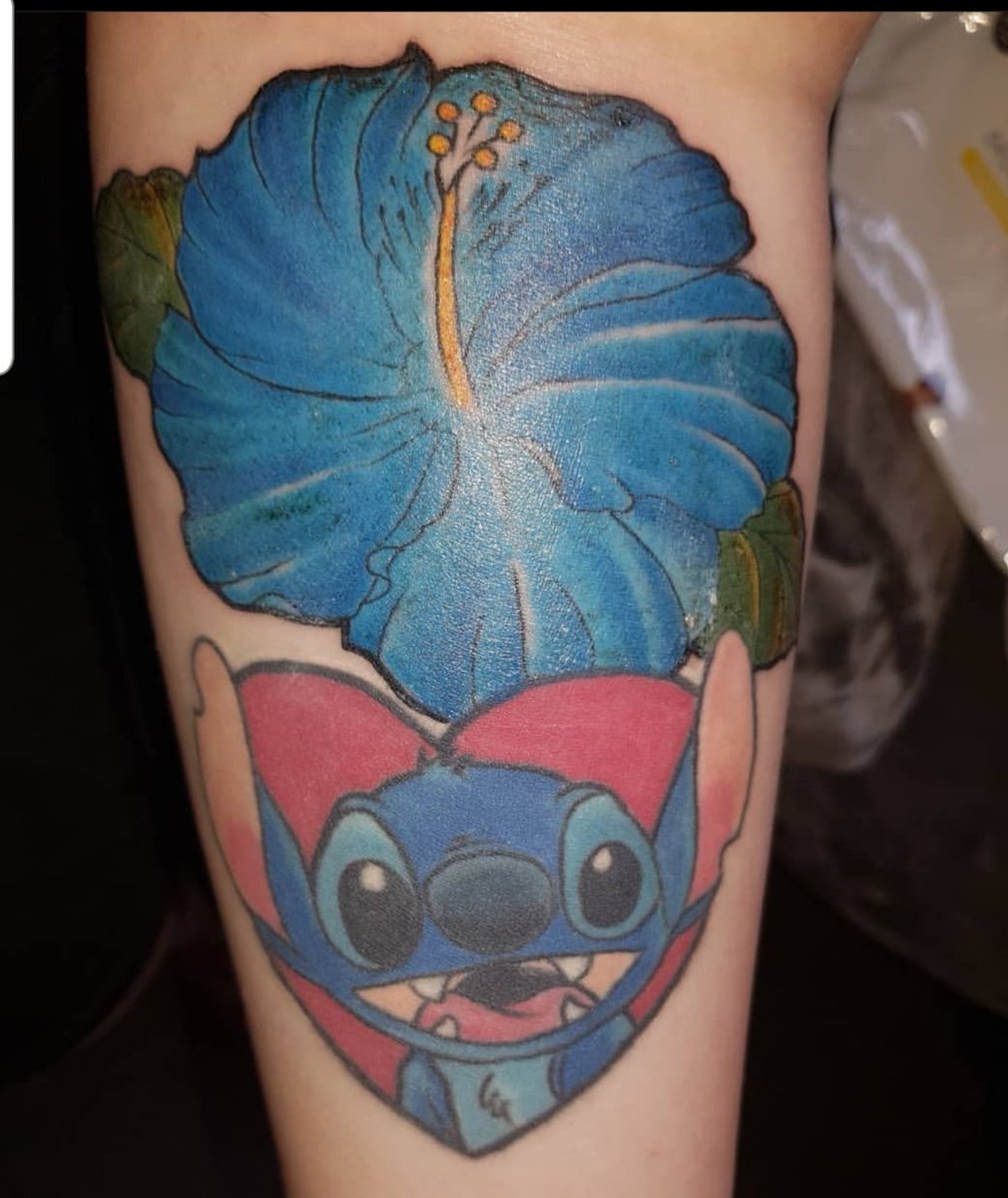 I forgot to post this when I got it done! I've had it for a year now!! I added a hibiscus flower, I want to add more but not sure what to add yet, any ideas? going for a stitch theme obviously! #tattoo #TattooLovers #tattooedwomen #disneytattoo #flowertattoo #tattoos